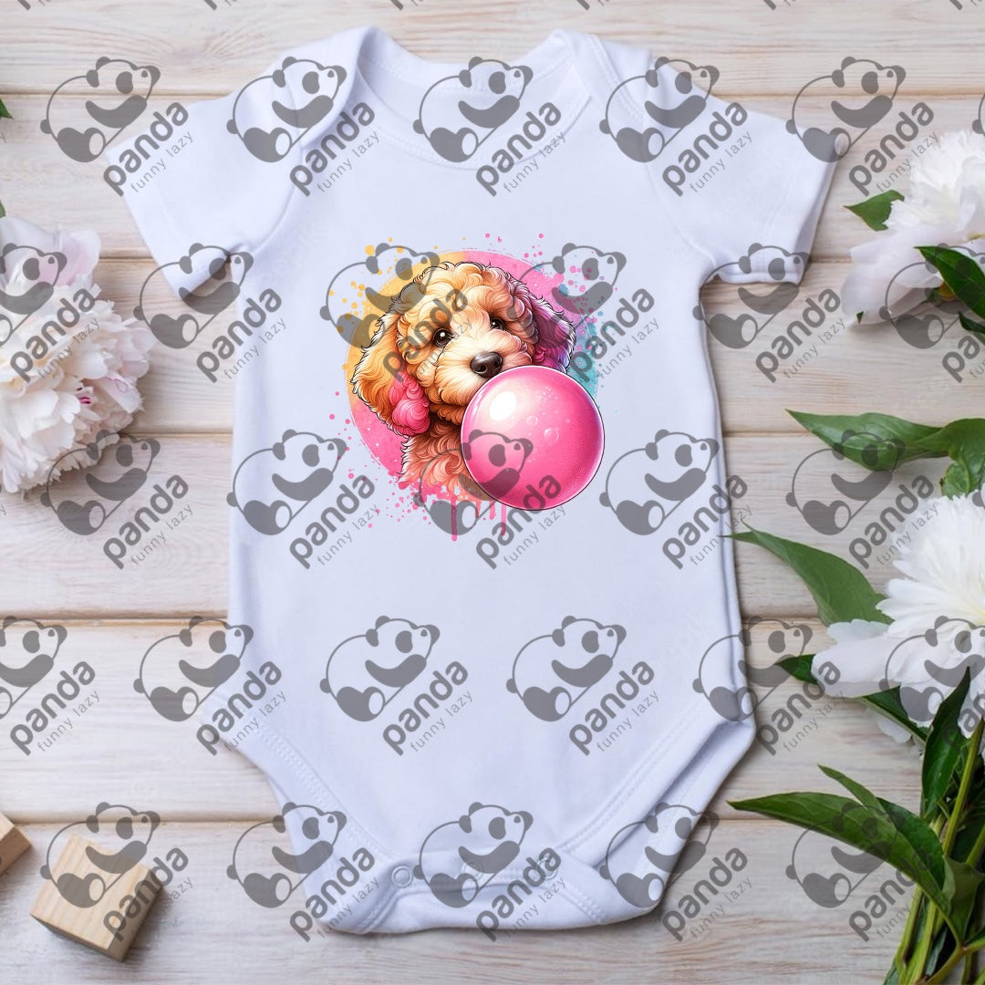 Golden doodle blowing bubble