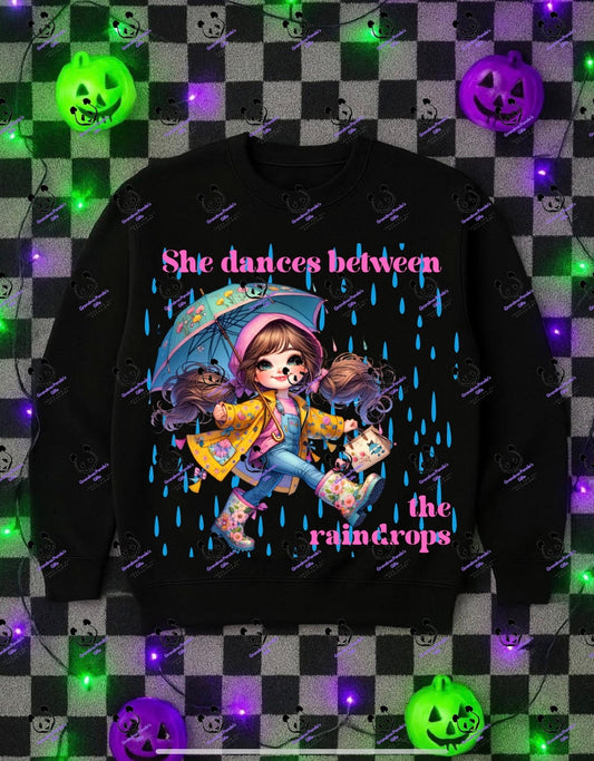 She dances between the raindrops